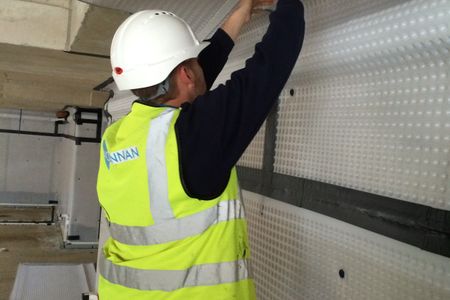 Installing a cavity drain membrane to walls and floors