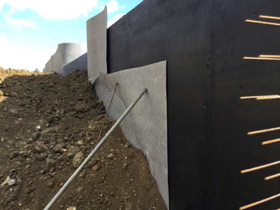 Application of Newton Drainage Membrane to an external wall
