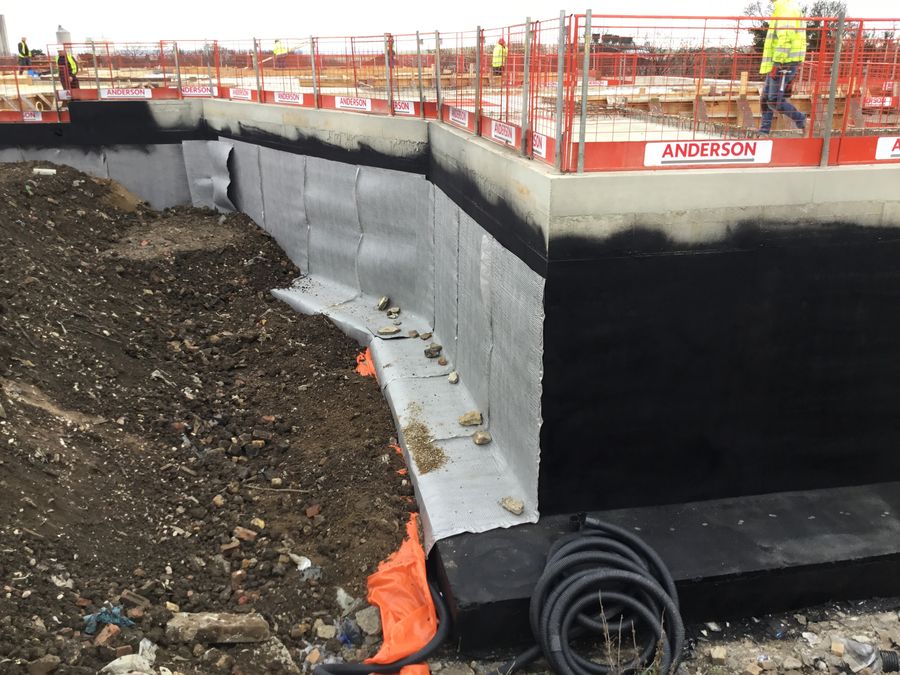 Application of Drainage Membrane to an external wall on-site