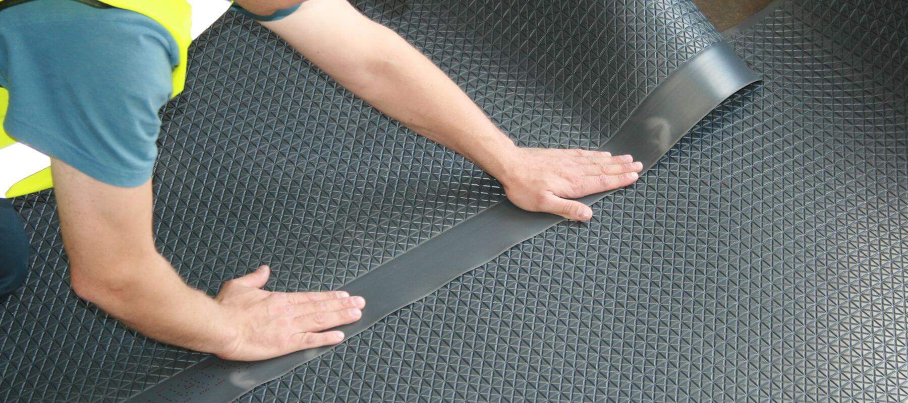 Application of sheet flooring membranes