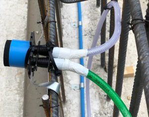 Concrete injection hose waterbars for sealing construction joints