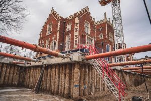 Extensive basement excavation using contiguous piles to create the structure